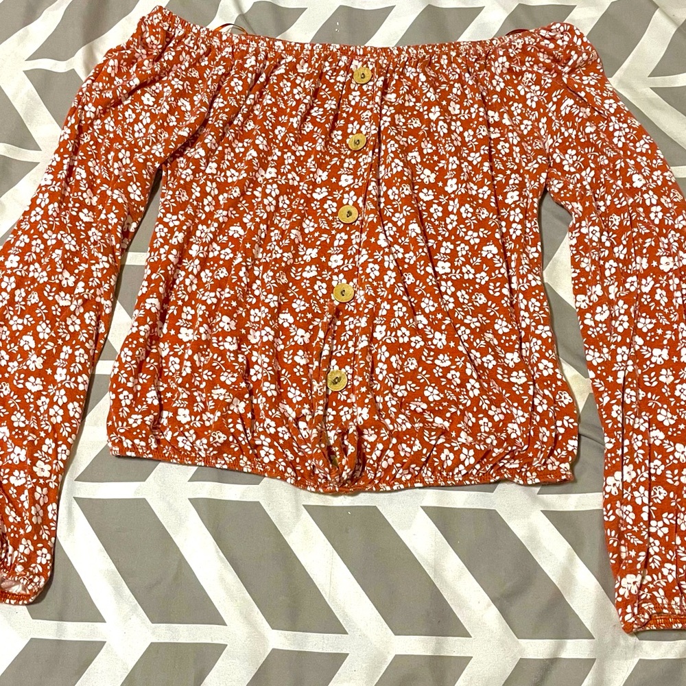 Coral orange overshoulder floral print crop top with wodden buttons on the front
